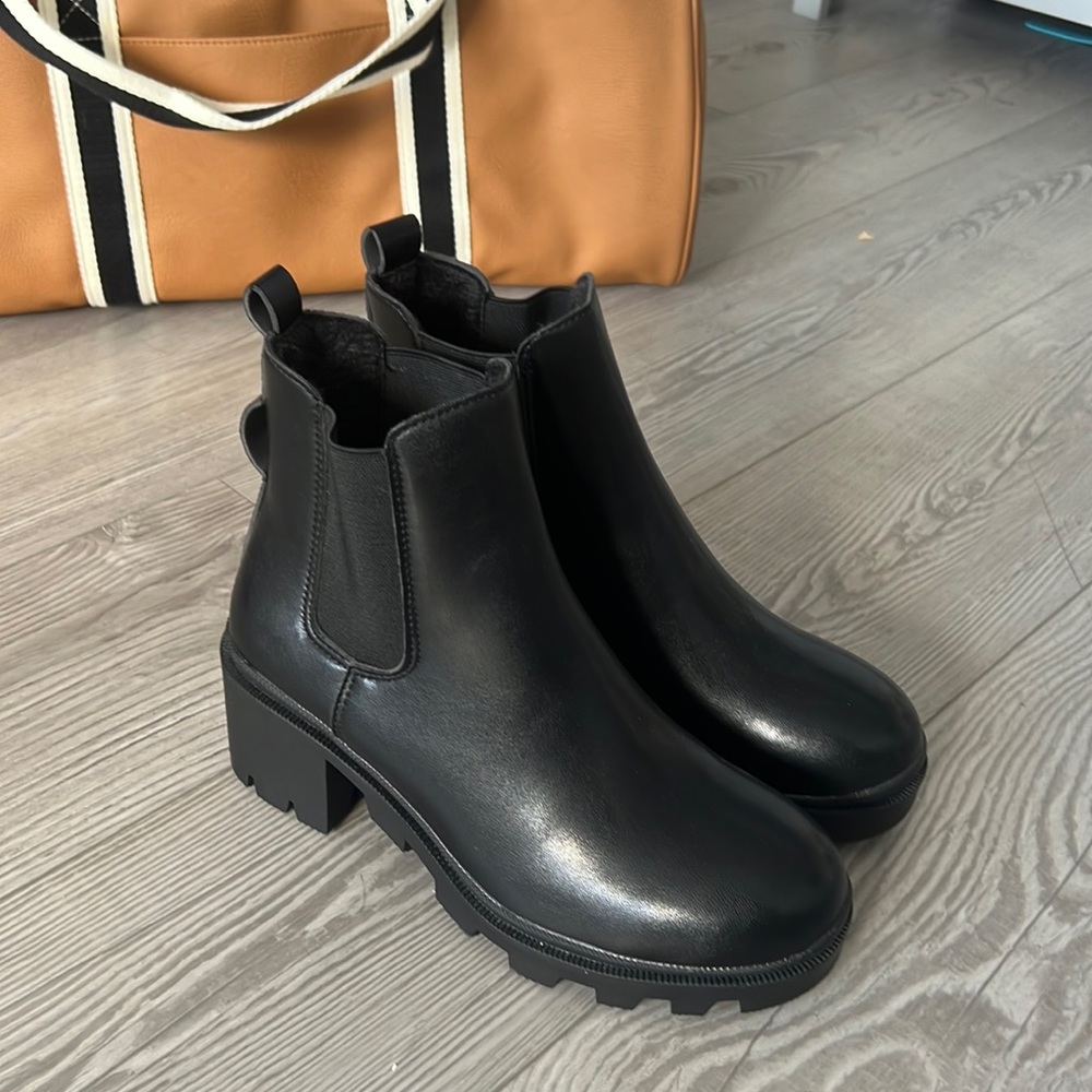 NWT!! New black faux leather rain casual booties!! Size 7.5!!